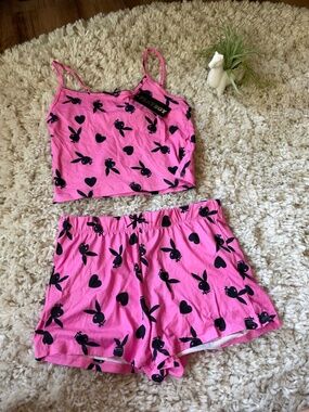PLAYBOY two-piece pajama set with a pink and black bunny and heart print. Includ
